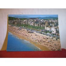 A BUSY BEACH, LLORET DE MAR, COSTA BRAVA, SPAIN used postcard. 1979 stamp =