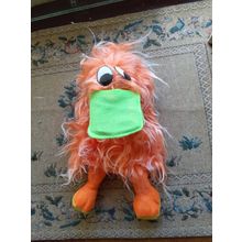 hand puppet orange fluffy platypus, beak opens to a tongue that rolls out