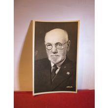 UNKNOWN GENTLEMAN WITH AN ENAMEL BADGE photograph dated 1948 =