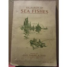 AN ALBUM OF SEA FISHES complete album of cigarette cards. by John Player 1935