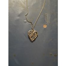 womens gold tone necklace with wired heart