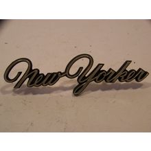1976 77 78 CHRYSLER NEW YORKER GOLD SCRIPT EMBLEM #3569955 W/ STUDS 71 72 73 74