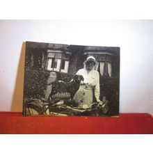 Lady with dog on motorbike and sidecar? small photograph =