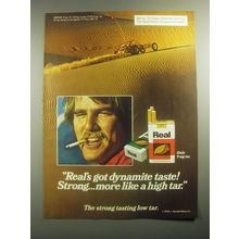 1979 Real Cigarettes Ad - Real's got dynamite taste! Strong.. More like a high
