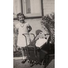 Child Pushing Large Plastic Toy Doll in Antique Pram Pushchair Real Photo Postca