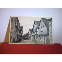 LACOCK, WILTSHIRE used postcard by Raphael Tuck =
