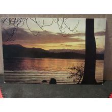 SUNSET ACROSS LAKE WINDERMERE, CUMBRIA. unused postcard. by J. Salmon =