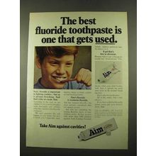 1975 Aim Toothpaste Ad - The Best Fluoride Gets Used