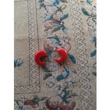 red plastic curved womens earrings