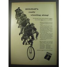 1956 Holiday Magazine Ad - Holiday's really wheeling along!
