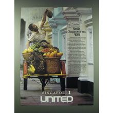 1989 United Airlines Ad - Smile. Singapore's just $1089