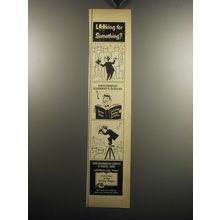 1957 Yellow Pages Ad - Looking for Something? Photographic Equipment & Supplies