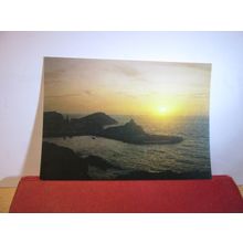 SUNSET AT ILFRACOMBE, DEVON unused postcard. by J Salmon dated 1984 =