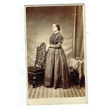 Victorian cdv photo young woman holding back of chair unstated photographer
