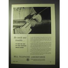 1950 Bell Telephone Ad - He Seals Out Trouble