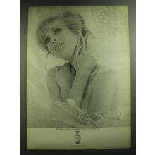 1969 Marcel Rochas Femme Perfume Ad - We think you'll like this perfume.