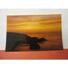 SUNSET AT ILFRACOMBE, DEVON unused postcard. Colourmaster dated 1984 =