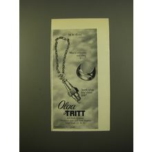 1961 Olga Tritt Man's Concave Seal Ring and Spark Plug Key Chain Advertisement