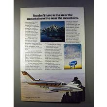 1975 Beechcraft Duke B60 Plane Ad - Near Mountains