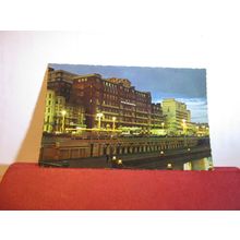 SEA-FRONT AT NIGHT, BRIGHTON, SUSSEX unused postcard by Constance dated 1969 =