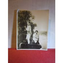 a YOUNG LAD PUNTING ON THE RIVER , 1920-30s? small photograph =