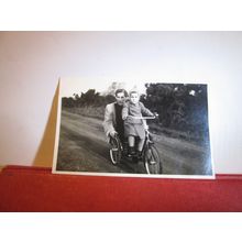 boy with father? on large child's tricycle small photograph c.1940 =