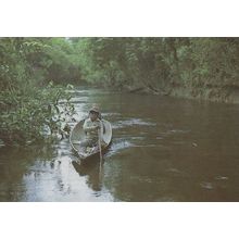 Child In Canoe Rowing Boat in Iquitos Peru Postcard