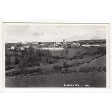 Village view of Blackawton Postcard RP Devon Publisher Kenneth E Ruth