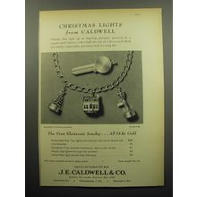 1960 J.E. Caldwell Jewelry Ad - Christmas Lights from Caldwell