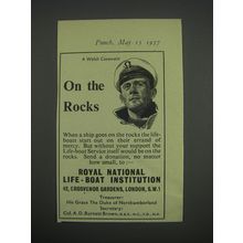 1957 Royal National Life-Boat Institution Ad - A Welsh Coxswain on the rocks