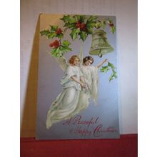 A HAPPY CHRISTMAS, used antique postcard by Wildt & Kray 1909 pm angels =
