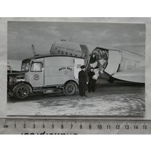 1999 postcard Airmail Being Loaded on B.E.A. Plane in 1951