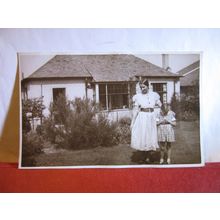 UNKNOWN BUNGALOW WITH MUM AND DAUGHTER vintage postcard RP by Jerome Ltd 1939 #