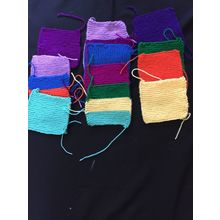 12 knitted squares in Various Colours
