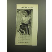 1957 Lord & Taylor Putnam-Morrill Cigarette-Pocket Apron Advertisement