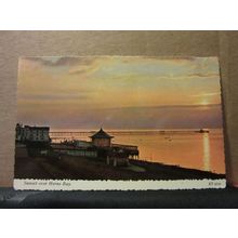 SUNSET OVER HERNE BAY, KENT. unused postcard by Valentine =