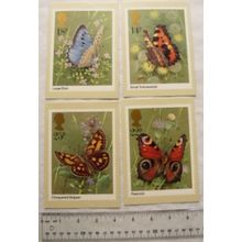 4 postcards showing Royal Mail Butterfly Stamps