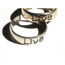 New Sterling Silver toe rings engraved with the word LIVE