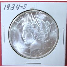 1934-D Peace Dollar. This Coin is a replica and contains NO precious metal.