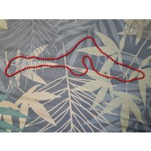 red plastic bead necklace hangs 58cm from neck