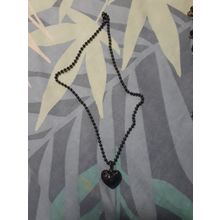 womens black 3D heart with stars cut out necklace