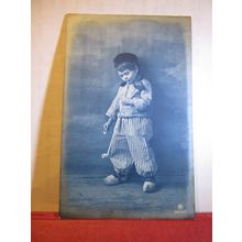 A YOUNG BOY, CLOGS, CLAY PIPE used postcard by Carlton publishing Co 1912 pm =