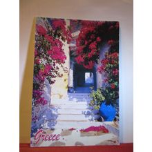A SUNNY FLORAL DOORWAY, GREECE used postcard 2010 stamp =