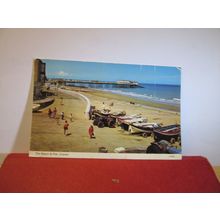 BEACH AND PIER, CROMER, NORFOLK. used postcard by Dennis 1983? pm =