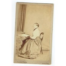 Victorian cdv photo young woman seated at desk Louth photographer