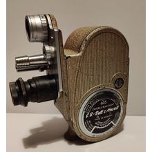 Vintage GB Bell & Howell 605 Double Run Eight cine camera. Case fairly scratched