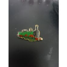 green train brooch