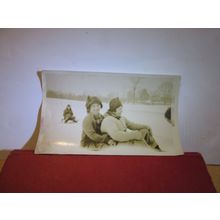 A COUPLE SLEDGING IN THE SNOW, vintage photograph 1930s =