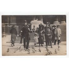 Feeding the Pigeons at St Paul's Cathedral Postcard RP London Publisher F F Race