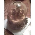 Water globe plays music Winter scene